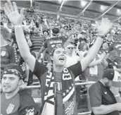  ?? STEPHEN M. DOWELL/STAFF PHOTOGRAPH­ER ?? Fans cheer before the start of the U.S. Soccer World Cup qualifier match against Panama at Orlando City Stadium.