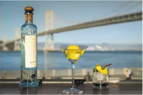  ?? John Storey / Special to The Chronicle ?? The Fog Point Martini, above, at Epic Steak on the Embarcader­o is made with Hangar One’s Fog Point vodka, which uses water collected as fog.