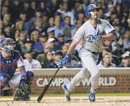  ?? Wally Skalij Los Angeles Times ?? ANDRE ETHIER of the Dodgers ties the score 1-1 with a second-inning home run as Chicago Cubs catcher Willson Contreras watches.