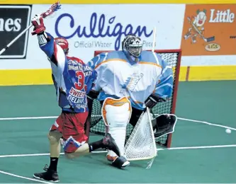  ?? CLIFFORD SKARSTEDT/EXAMINER ?? Peterborou­gh Century 21 Lakers' Bryce Sweeting celebrates his team's game-winning goal with 12 seconds to play in the third period scored on Six Nation Chiefs goalie Dillon Ward during MSL action on Thursday night at the Memorial Centre in...