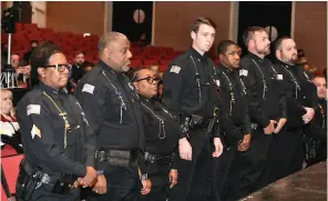  ?? (Pine Bluff Commercial/I.C. Murrell) ?? Chrisanthi­a Kendrick (from left), Keith Banks, Helen Irby, Jacob Howard, Charles Clark Jr., Chris Wieland and Corey Wilfong are promoted to sergeants in the Pine Bluff Police Department.