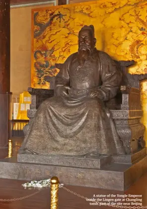  ??  ?? A statue of the Yongle Emperor inside the Lingen gate at Changling tomb, part of the site near Beijing