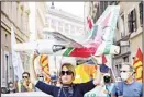  ??  ?? Workers of former Italian national flag carrier Alitalia demonstrat­e outside the Italian Parliament in downtown Rome, Friday, Sept. 10, 2021. (AP)