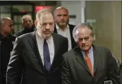  ?? SETH WENIG — THE ASSOCIATED PRESS ?? Harvey Weinstein, left, arrives at New York Supreme Court with his attorney Benjamin Brafman on Thursday.