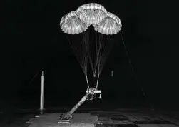  ?? NASA via the New York Times ?? An Apollo parachute testing is conducted in the 1960s at another NASA hub that played a key role in the lunar race.