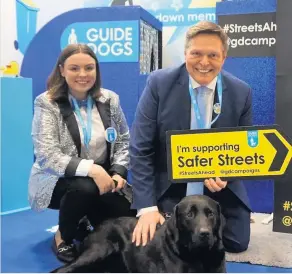  ??  ?? Fact-finding meeting Blind MP Stephen Kerr with Emily Horsfall from Guide Dogs for the