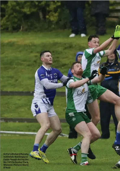  ??  ?? St Pat’s Richard Murphy outfields Baltinglas­s’ Conor Keogh during the Div 1 SFL in Dunbur Park, Wicklow. Picture: Garry O’Neill