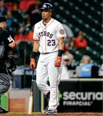  ?? Photos by Elizabeth Conley / Staff photograph­er ?? Astros left fielder Michael Brantley slinks off the field after striking out in the ninth to finish off an 0-for-5 night on Monday. The Royals won for fourth time in five games between the teams this season.