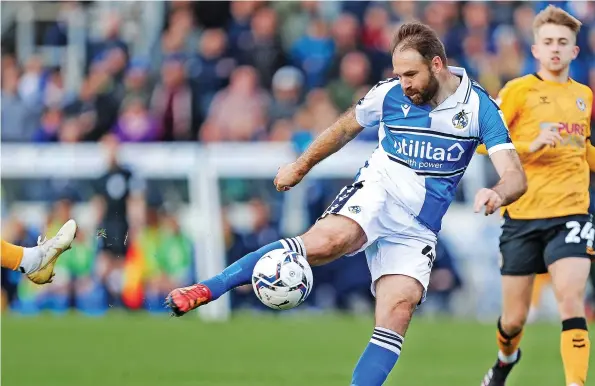  ?? ?? Brett Pitman scores Bristol Rovers’ goal in the League Two game against Newport County at the Memorial Stadium