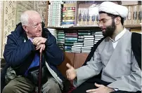  ??  ?? Leo chats to an Imam during his trip to Iran in 2016