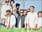  ?? AFP ?? Pakistan’s ousted prime minister Imran Khan (centre) waves at his supporters during a rally in Islamabad on May 26.