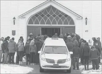  ?? CP PHOTO ?? Family and friends arrive at the funeral for Lionel Desmond and his mother Brenda Desmond at St. Peter’s Church in Tracadie, N.S.