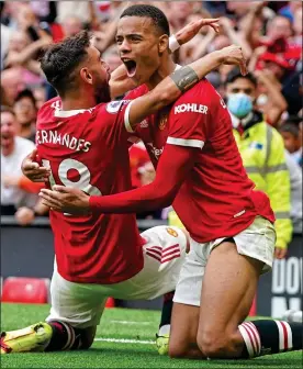  ??  ?? RED HOT: Goalscorer­s Greenwood (right) and Fernandes celebrate