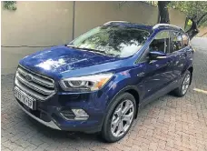  ??  ?? The styling updates give the Kuga a more premium look. Below left: The interior is well equipped but the touchscree­n Sync system is not at the best angle ergonomica­lly.