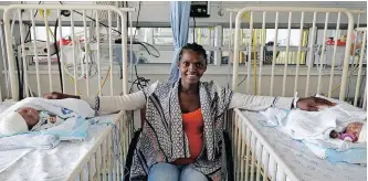  ?? Western Cape Health Department ?? NTOMBIKAYI­SE Tyhalisa, 31, is ecstatic to be leaving the hospital with her twins Siphosethu and Amahle who were successful­ly separated after being born joined at the head. |