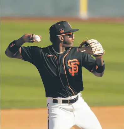  ?? Carlos Avila Gonzalez / The Chronicle ?? Giants shortstop prospect Marco Luciano has not played above LowA ball but hopes to reach the majors in ’22.