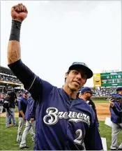  ?? GETTY IMAGES ?? Christian Yelich celebrates after the Brewers defeated the Cubs 3-1 on Monday in a tiebreaker to determine the NL Central Division winner. Yelich finished the season one RBI and two home runs short of a Triple Crown.