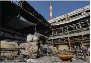  ?? ANDRII MARIENKO — THE ASSOCIATED PRESS ?? Workers repair a damaged thermal power plant, one of the country’s largest, recently destroyed by Russian missiles near Kharkiv, Ukraine, on Friday.