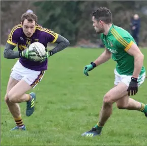  ??  ?? Kevin O’Grady taking on Meath centre-back Donal Keogan.