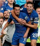 ??  ?? Pedro, left, celebrates his goal for Chelsea with team-mate Cesar Azpilicuet­a.