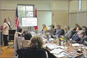  ?? NWA Democrat-Gazette/DAVE PEROZEK ?? Michelle Hayward, the Fayettevil­le School District’s director of elementary and middle school education, presents informatio­n during a special meeting of the School Board on Friday to work on the district’s strategic plan.