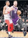  ?? AFP ?? The Kings’ Domantas Sabonis, right, in action against the Nets’ Nic Claxton.