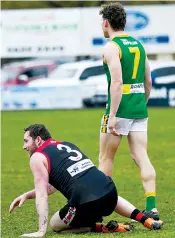  ?? ?? Warragul’s Jed Lamb is left a little worse for wear after a contest with Leongatha’s Jackson Harry.