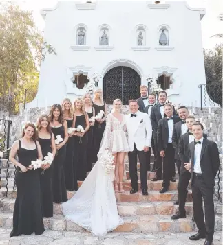  ??  ?? Karl Stefanovic and Jasmine Yarbrough and wedding party after the ceremony in Mexico.