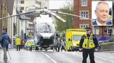  ?? Picture: Martin Apps FM4094433/ FM4083201 ?? The air ambulance land on The Broadway bridge over the Medway in Maidstone; inset, chief executive Adrian Bell