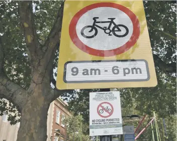  ??  ?? Cycling is banned on Bridge Street for part of the day