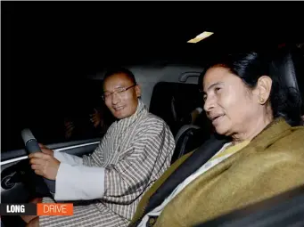  ?? — PTI ?? Bhutan Prime Minister Tshering Tobgay drives with West Bengal chief minister Mamata Banerjee during her visit to Thimpu, Bhutan, recently.