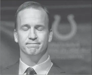  ?? Sam Riche, Mcclatchy News ?? Peyton Manning tries to collect himself as he speaks at a news conference in Indianapol­is on Wednesday.