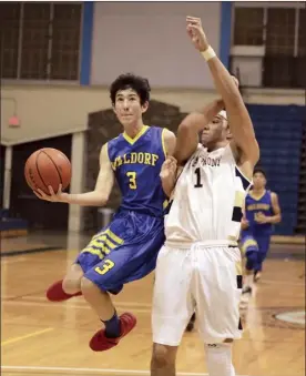  ??  ?? Haleakala Waldorf’s Will Pang goes up for a layup against St. Anthony’s Chris Neilson in the second quarter.