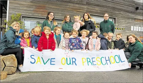  ??  ?? Children and staff at Harrietsha­m Pre-School pictured at the beginning of their 15-month plight to find a new home