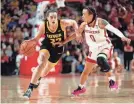  ?? CODY SCANLAN/THE DES MOINES REGISTER ?? Iowa’s Caitlin Clark scored 31 points Sunday in the loss to Nebraska.