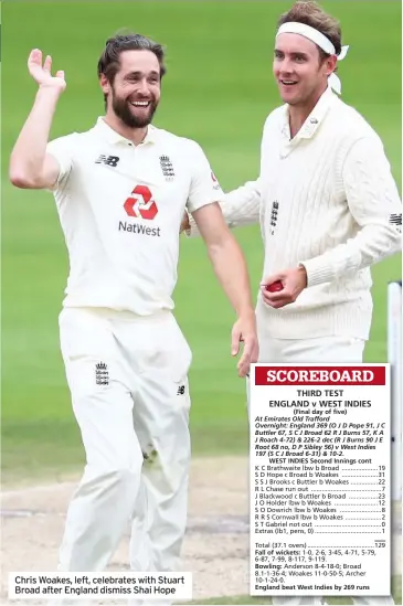  ??  ?? Chris Woakes, left, celebrates with Stuart Broad after England dismiss Shai Hope