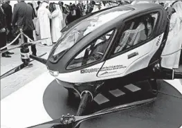  ?? JON GAMBRELL/AP ?? The EHang 184 appears Monday at the World Government Summit in Dubai, United Arab Emirates. It can fly for 30 minutes, has a range of 31 miles and a top speed of 100 mph.