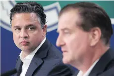  ?? DARRYL DYCK/THE CANADIAN PRESS ?? Canucks head coach Travis Green, left, and GM Jim Benning made it clear no player’s position is set in stone.