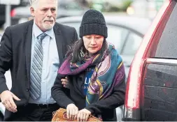  ?? DARRYL DYCK THE CANADIAN PRESS ?? Huawei chief financial officer Meng Wanzhou arrives at a parole office with a security guard in Vancouver on Wednesday.