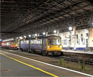  ?? CARL CHAMBERS. ?? A Northern Class 142 and a Northern Class 150/2 wait to leave Huddersfie­ld on separate trains. The Rail Delivery Group has unveiled a new partnershi­p plan that discusses investment and improvemen­ts. While Pacers will be replaced by the end of 2019, the ‘150s’ will remain with Northern despite new trains being delivered. The route through the Yorkshire station is due to be electrifie­d, although speculatio­n remains that the project will be cancelled.