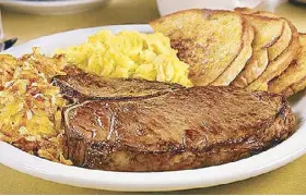  ??  ?? Here’s the beef: Denny’s T-bone Steak &amp; Eggs