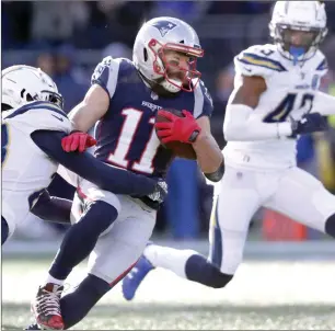  ?? Photo by Louriann Mardo-Zayat / lmzartwork­s.com ?? Patriots wide receiver Julian Edelman (11) produced nine catches for 151 yards in New England’s 41-28 victory over the Los Angeles Chargers to send the Pats back to the AFC title game.