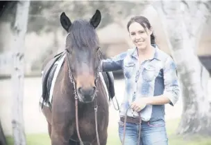  ??  ?? Carmarthen­shire horse trainer Joanna Lowes.