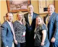  ??  ?? Advocates from the Down Syndrome Associatio­n of Central Oklahoma met with legislator­s for the annual Buddy Walk on Washington in April. From left, organizati­on members Josh Harlow and Fara Taylor met with U.S. Rep. Tom Cole, R-Moore, along with fellow...