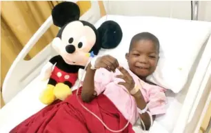  ??  ?? Ali Ahmadu, the six-year-old Chibok boy paralyzed by Boko Haram on his hospital bed in Dubai after a successful surgery sponsored by Dickens Sanomi Foundation.