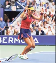  ?? Elsa / Getty Images ?? Emma Raducanu celebrates after defeating Leylah Annie Fernandez to win the U.S. Open title on Saturday.