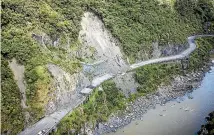  ?? GRANT MATTHEW/STUFF ?? Rocks and slips litter the old Manawatu¯ Gorge road.