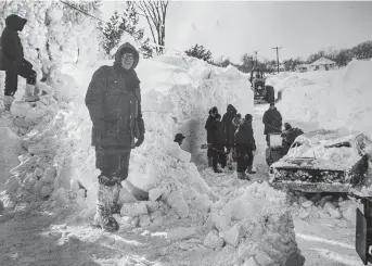  ?? FAMILY PHOTO ?? A photo of Cecil Mitchell in Port Colborne after the blizzard of 1977 on a rescue mission with the army.