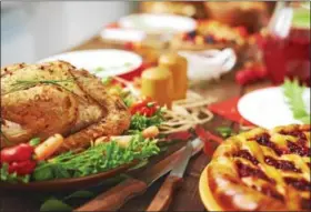  ?? METRO CREATIVE GRAPHICS ?? Let guests make suggestion­s that incorporat­e their dietary restrictio­ns and choices during holiday meal planning..