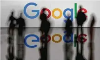  ?? Kenzo Tribouilla­rd / Getty Images ?? Oracle Corp. is working behind the scenes to persuade regulators to rein in Google’s search-and-advertisin­g business.